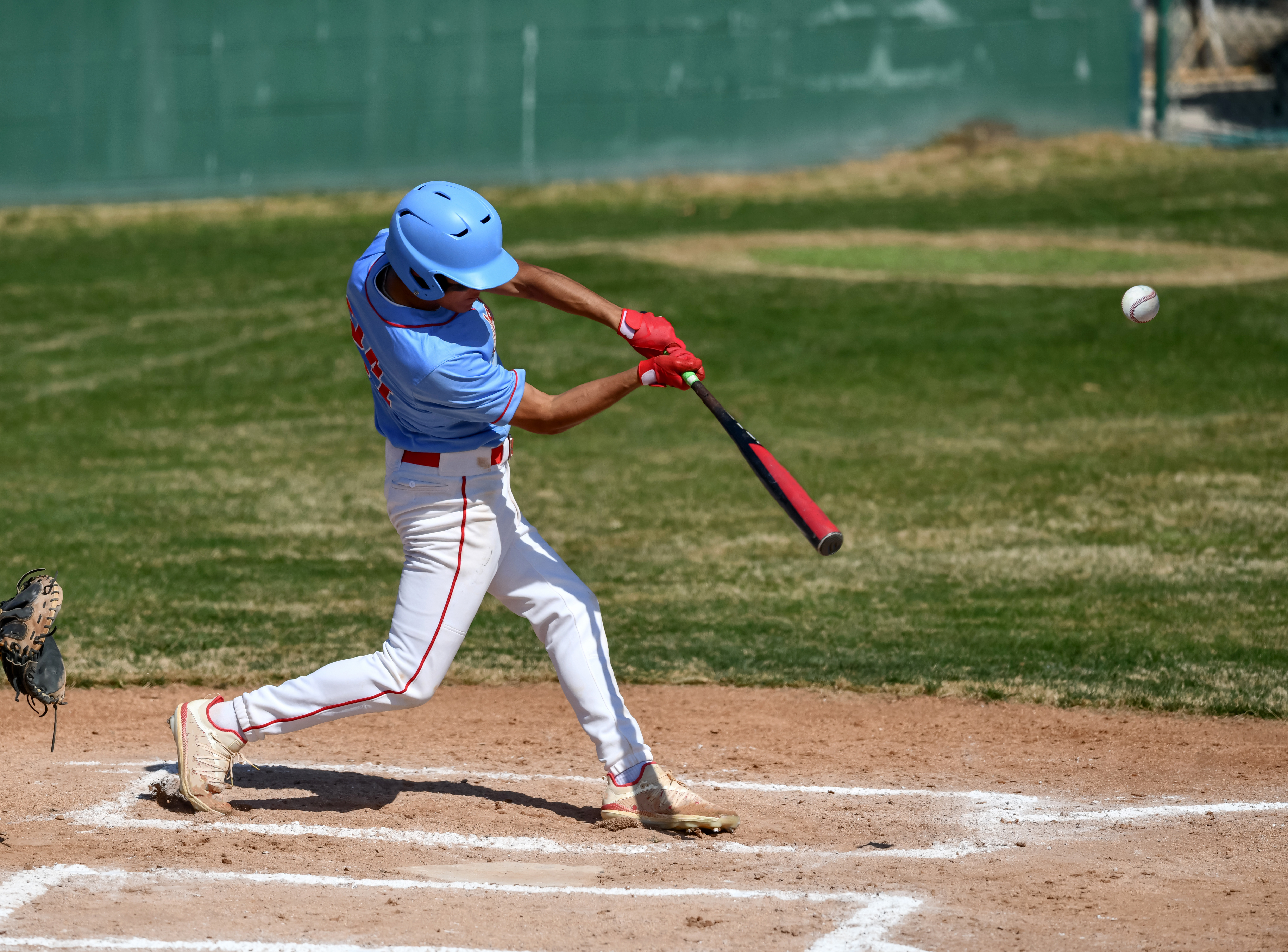 high school student playing baseball