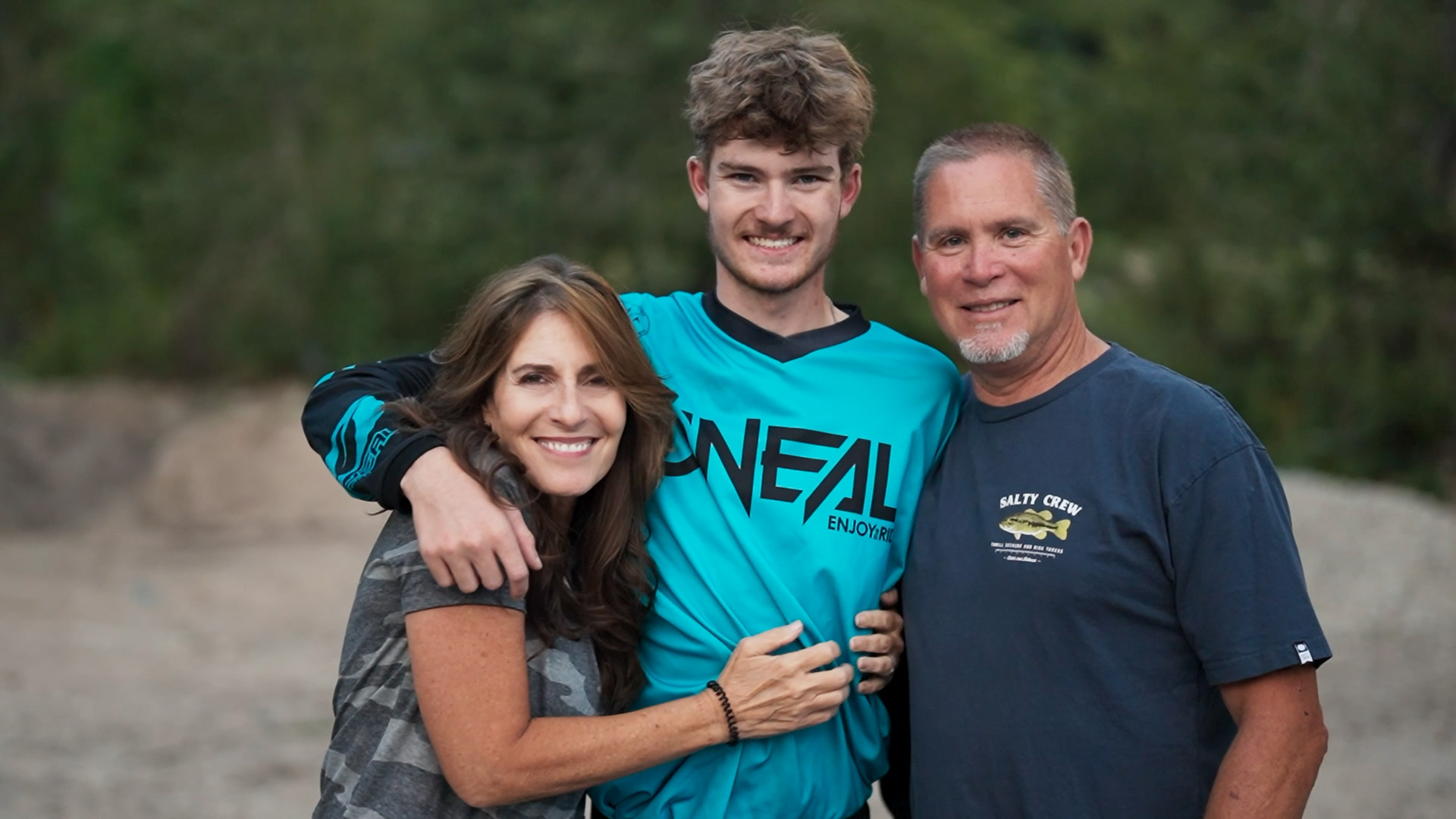 Trent and his parents.